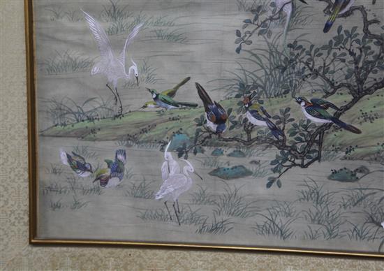 A large Chinese painting on silk in the hundred bird design, 20th century, 54 x 124cm excl. brocade covered frame